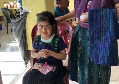 Child receiving new glasses